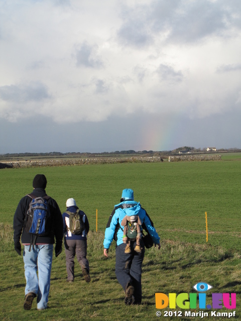 SX25503 Matt, Jenni and Libby walking by faint rainbow